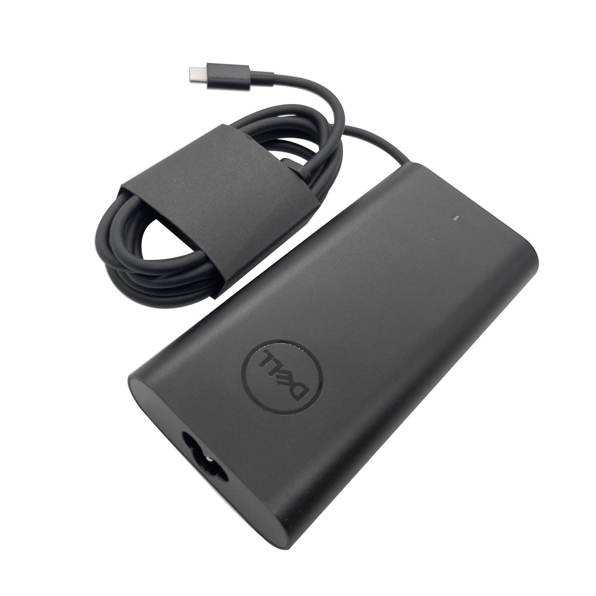 Dell AC adapter in non-retail packaging shown for reliable replacement.