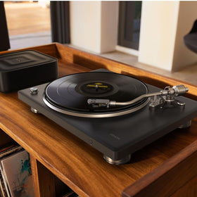 Denon DP-500BT auto tonearm lift protects your stylus.