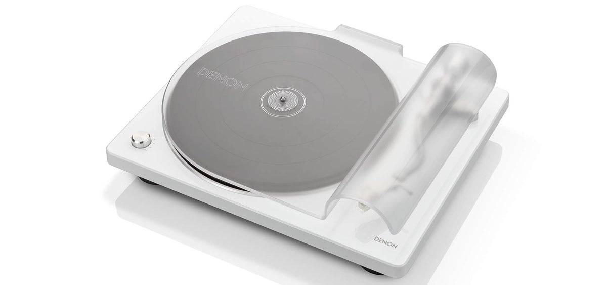 Denon DP400 curved tonearm close-up shows precise tracking and gentle record handling
