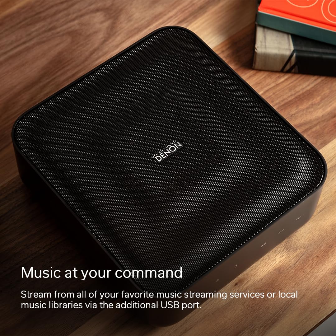 Denon Home Amplifier in a living room setup, delivering immersive Dolby Digital Plus sound.
