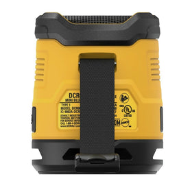 DEWALT DCR008 fitted in a cup holder for stable placement benefit