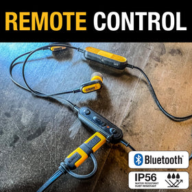 DEWALT earbuds next to tools showing scale and worksite readiness