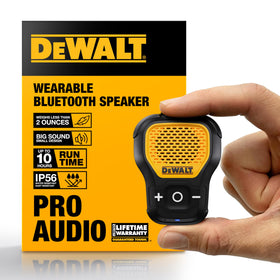 DEWALT wearable Bluetooth speaker clipped to a tool belt for hands-free audio