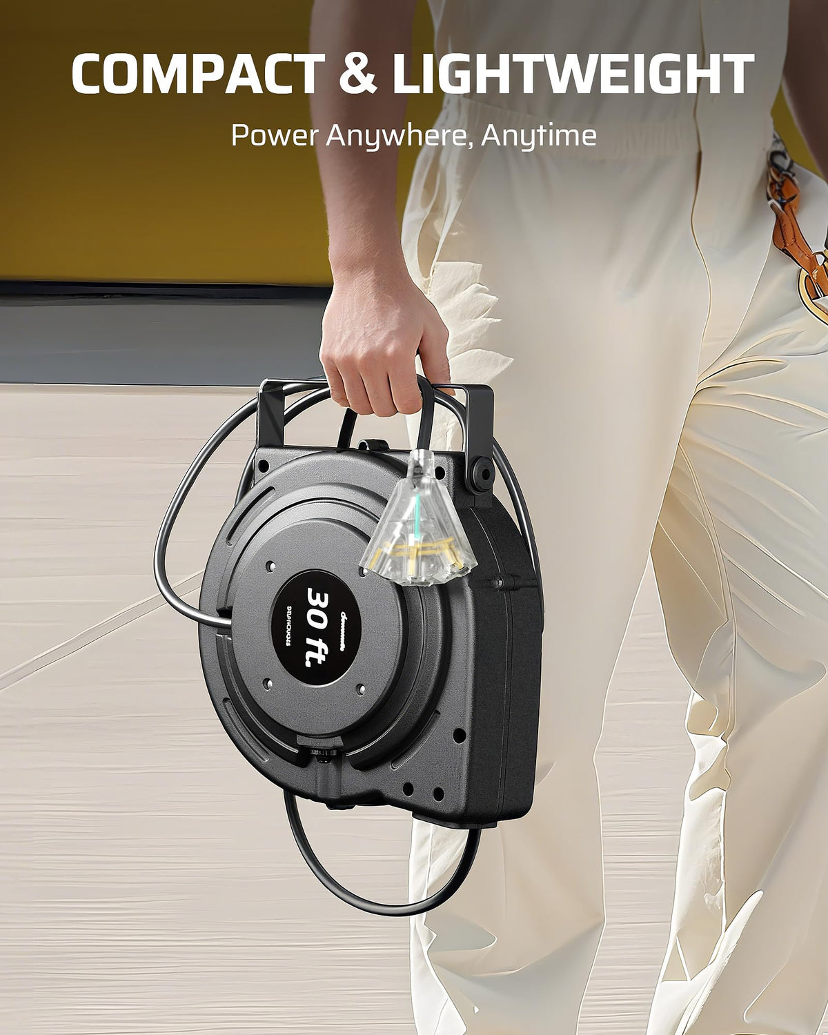DEWENWILS extended cord powering a shop tool, demonstrating reach and tidy retraction benefit