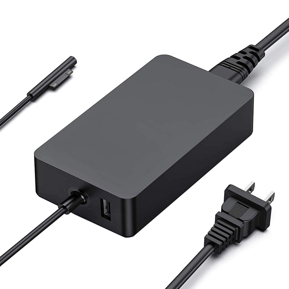 DHMXDC 65W Surface Pro charger on desk powering a Surface Pro 9 quickly and safely