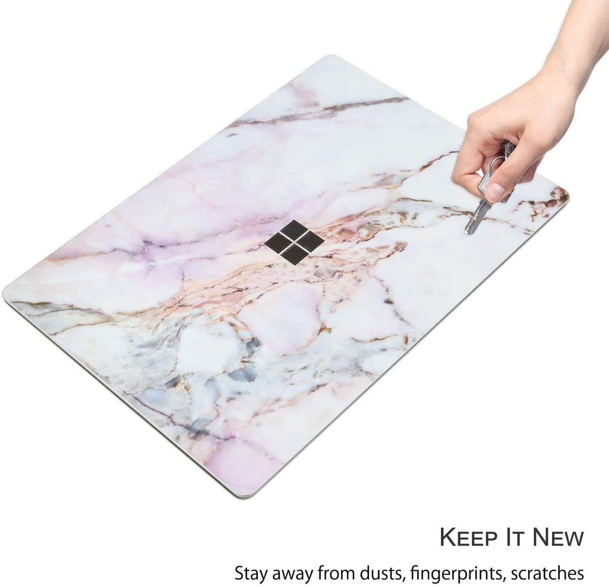 Digi-Tatoo cracked marble skin on Laptop Go 2 adds elegant, fingerprint-resistant style.