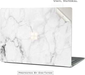 Digi-Tatoo Fresh Marble installation on Surface Laptop Go 2 demonstrates bubble-free fit.