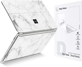 Digi-Tatoo Fresh Marble skin on Surface Laptop Studio 2 provides stylish scratch protection.