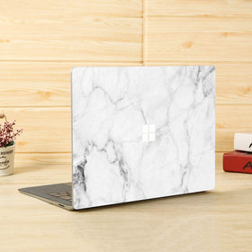 Digi-Tatoo Fresh Marble design keeps the 2025 Surface Laptop looking refined and protected