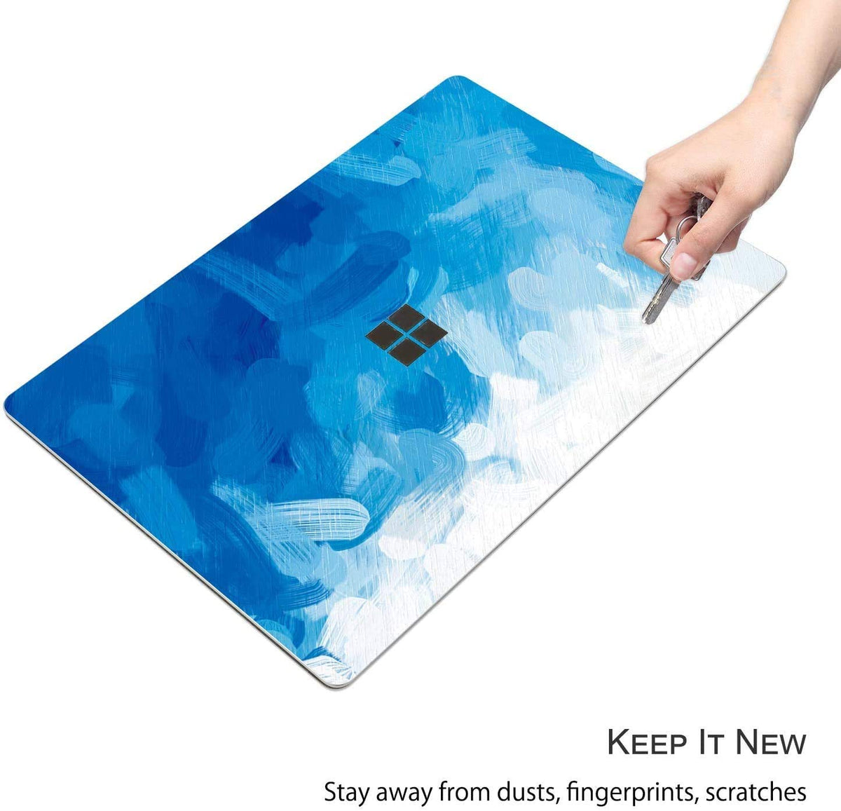 Digi-Tatoo Surface Laptop Go 2 skin in blue paint protects from scratches
