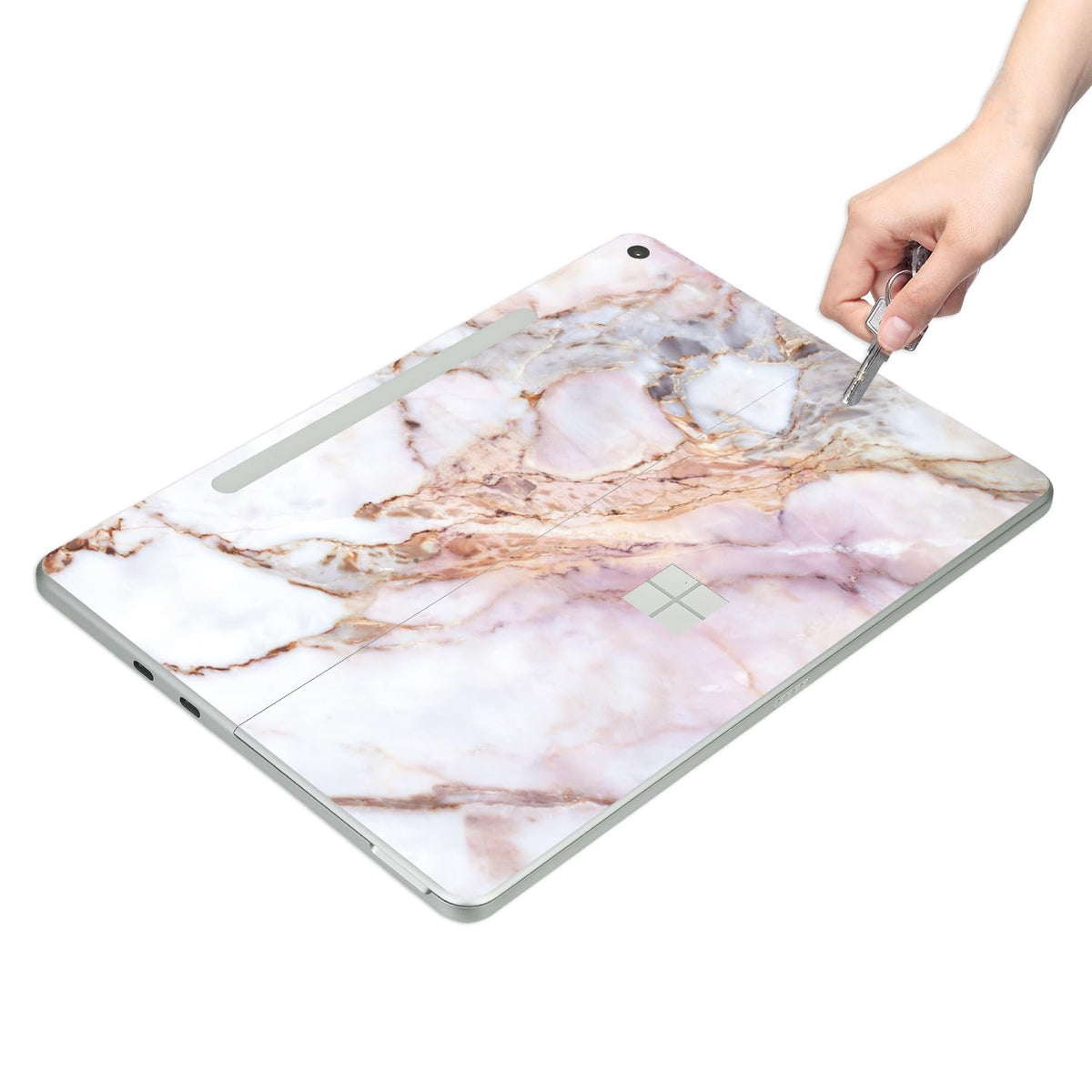 Textured cracked marble finish on Digi-Tatoo Surface Pro skin for premium look
