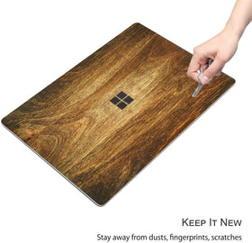 Digi-Tatoo Wood Texture 2 skin on Surface Laptop Go 2 resists dust and fingerprints.