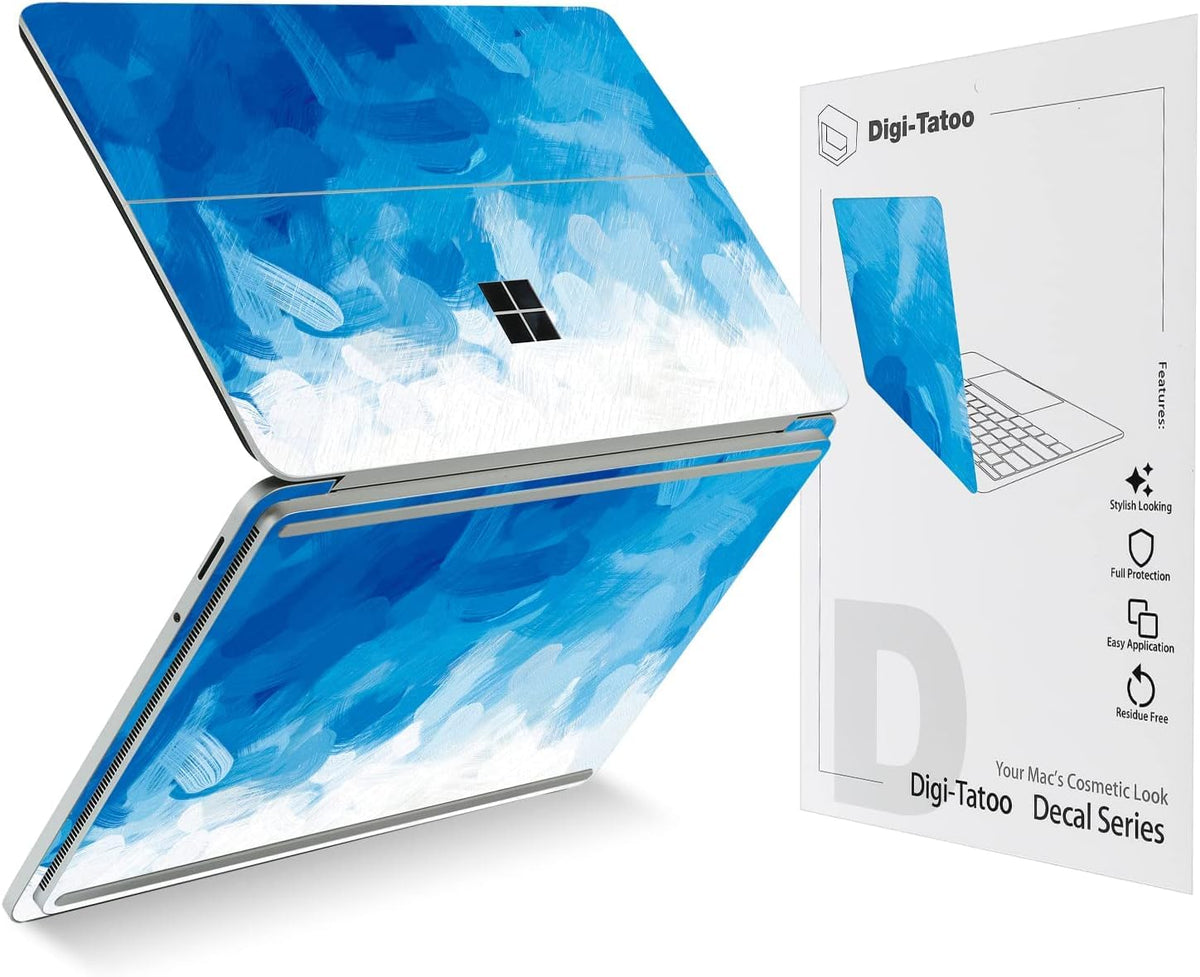 Digi-Tatoo Surface Laptop Studio 2 blue skin application shows bubble-free ease and daily protection