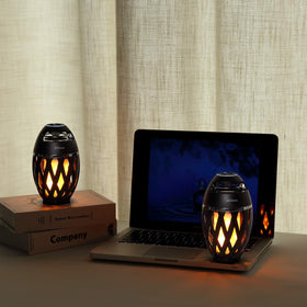 DiKaou Torch Atmosphere Light enhances evenings with warm visuals.
