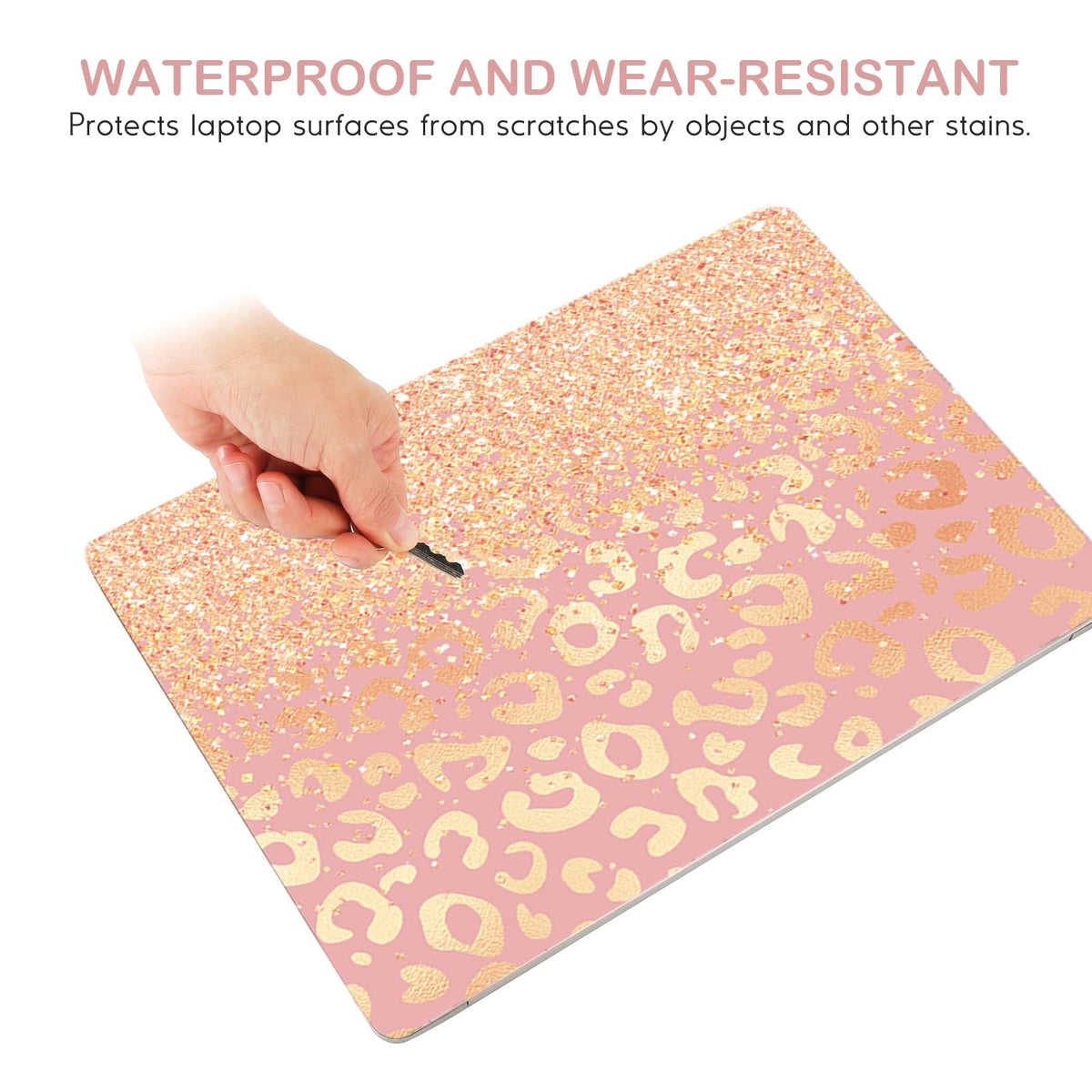 DINKY leopard print laptop skin is removable without leaving sticky residue.