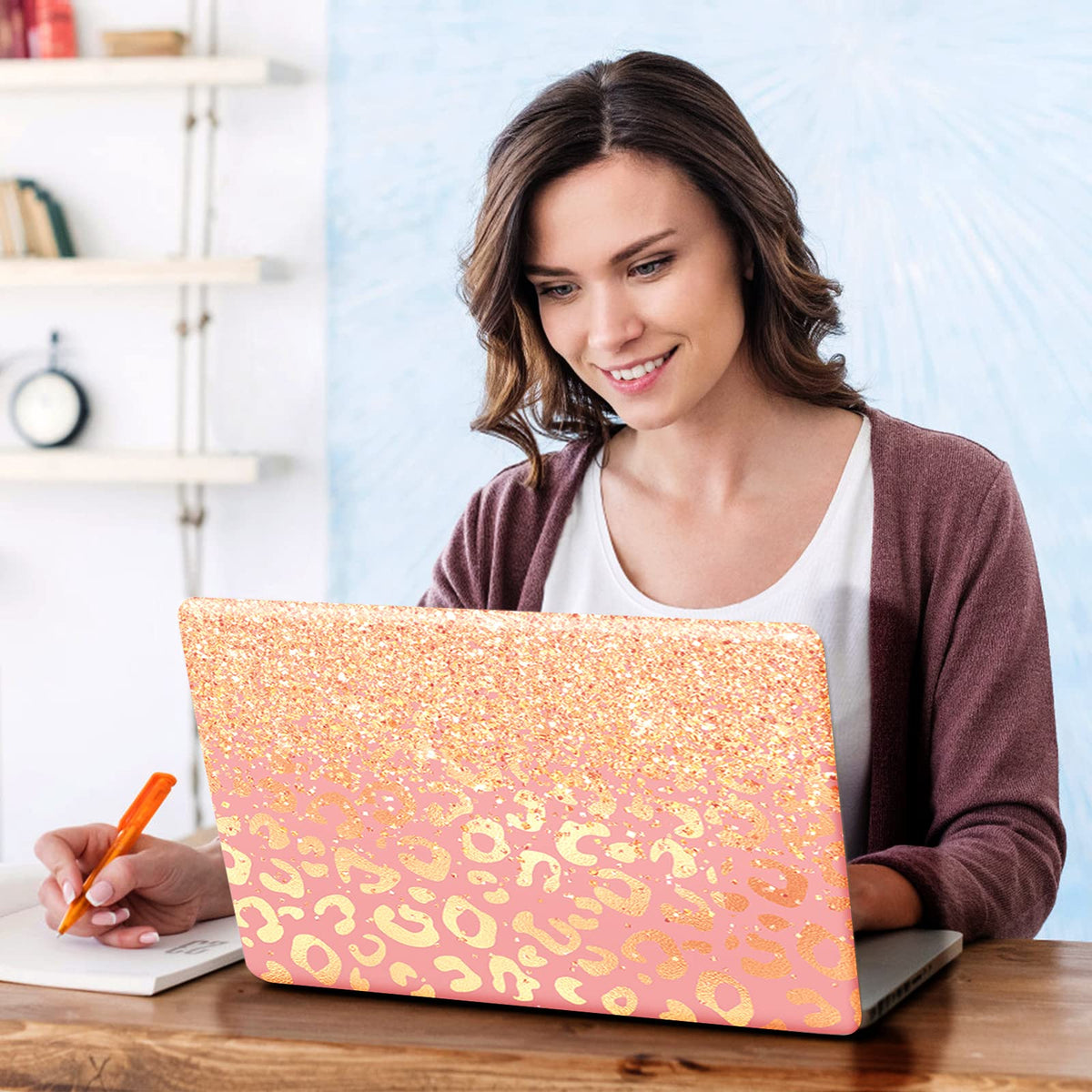 DINKY leopard print laptop skin creates a stylish protective accessory.