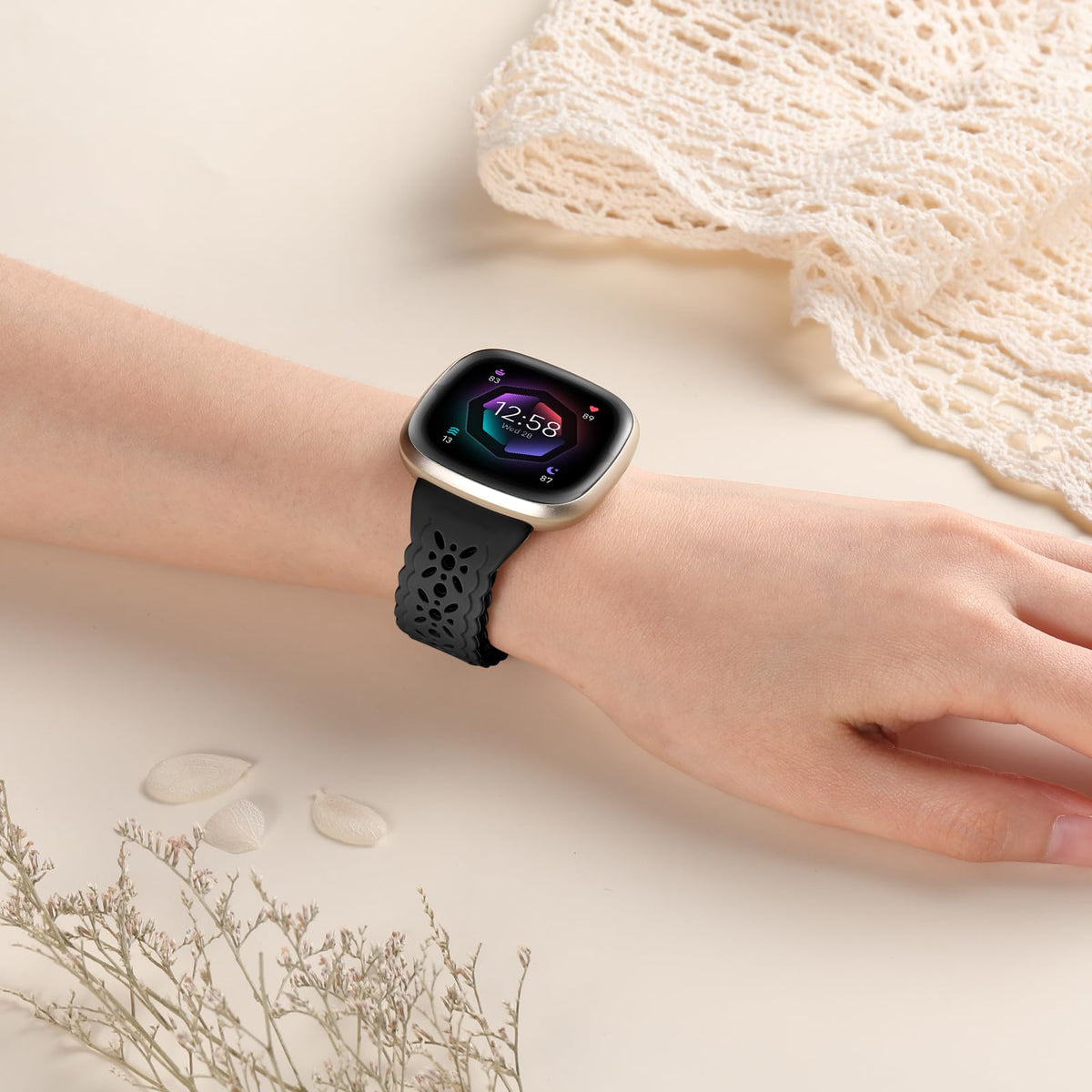 Adjustable hollow-out band fits wrists from 5.3 to 7.8 inches.