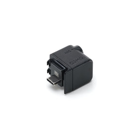 DJI Osmo Action Audio Adapter securely mounts for high-speed audio capture