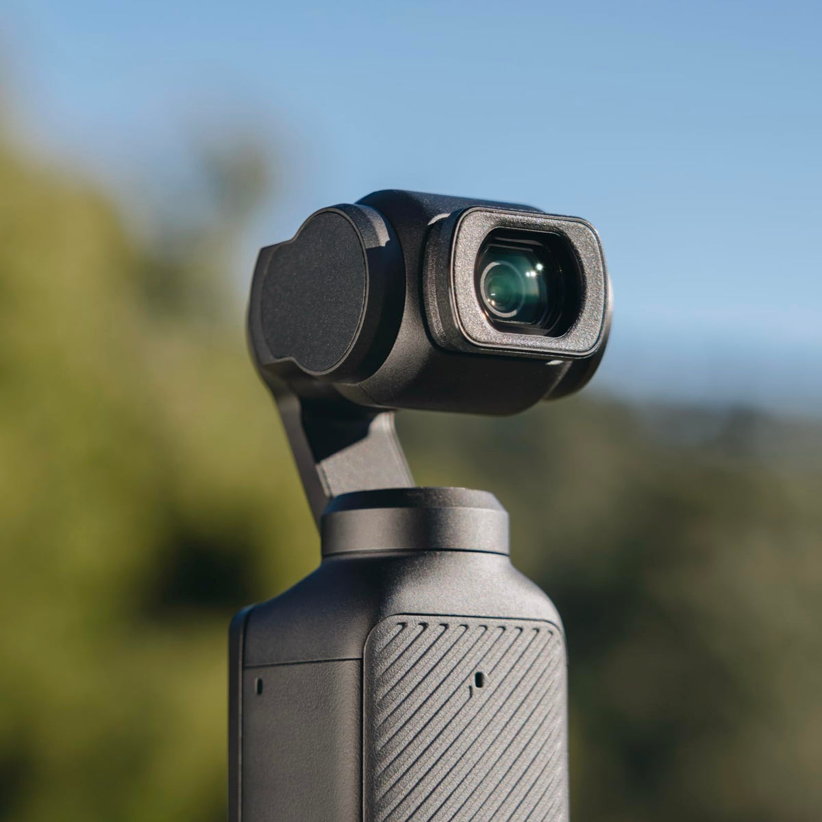 DJI Osmo Pocket 3 wide-angle lens used during travel capturing expansive landscapes benefit