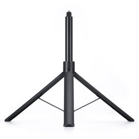 DJI Osmo tripod size comparison to hand showing compact travel-friendly scale