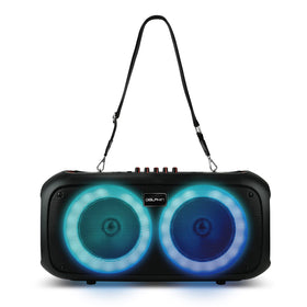 Dolphin boombox scale next to a bottle showing compact portable size