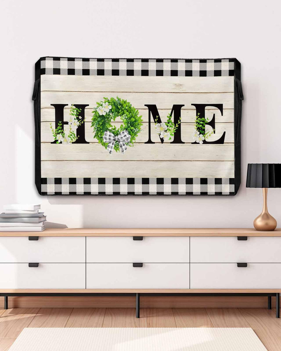 DOME-SPACE front view of retro plaid cover protecting TV, adds vintage charm