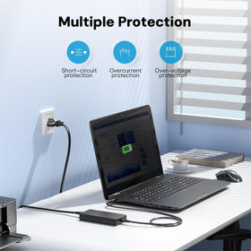DONGERDI adapter next to laptop for scale showing compact design and portability benefit