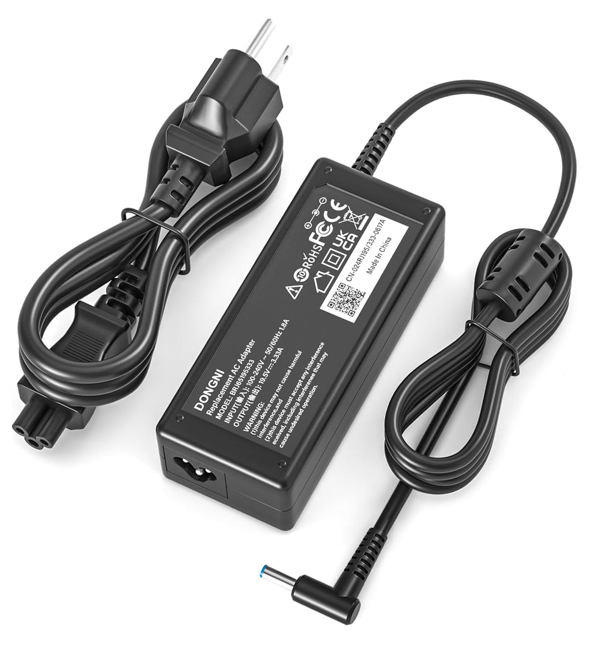 DONGNI 65W AC adapter front view shows compact design for travel.