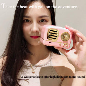 Dosmix pink speaker in a bag illustrating portability