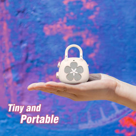 DOSS Candy bag charm attaches to purses for easy music access.