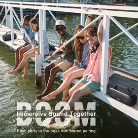 DOSS Extreme Boom poolside setting with IPX6 waterproof design for splash resistance.