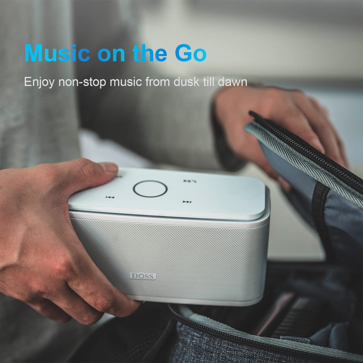 DOSS SoundBox Touch held in hand, DOSS portability for travel and commuting