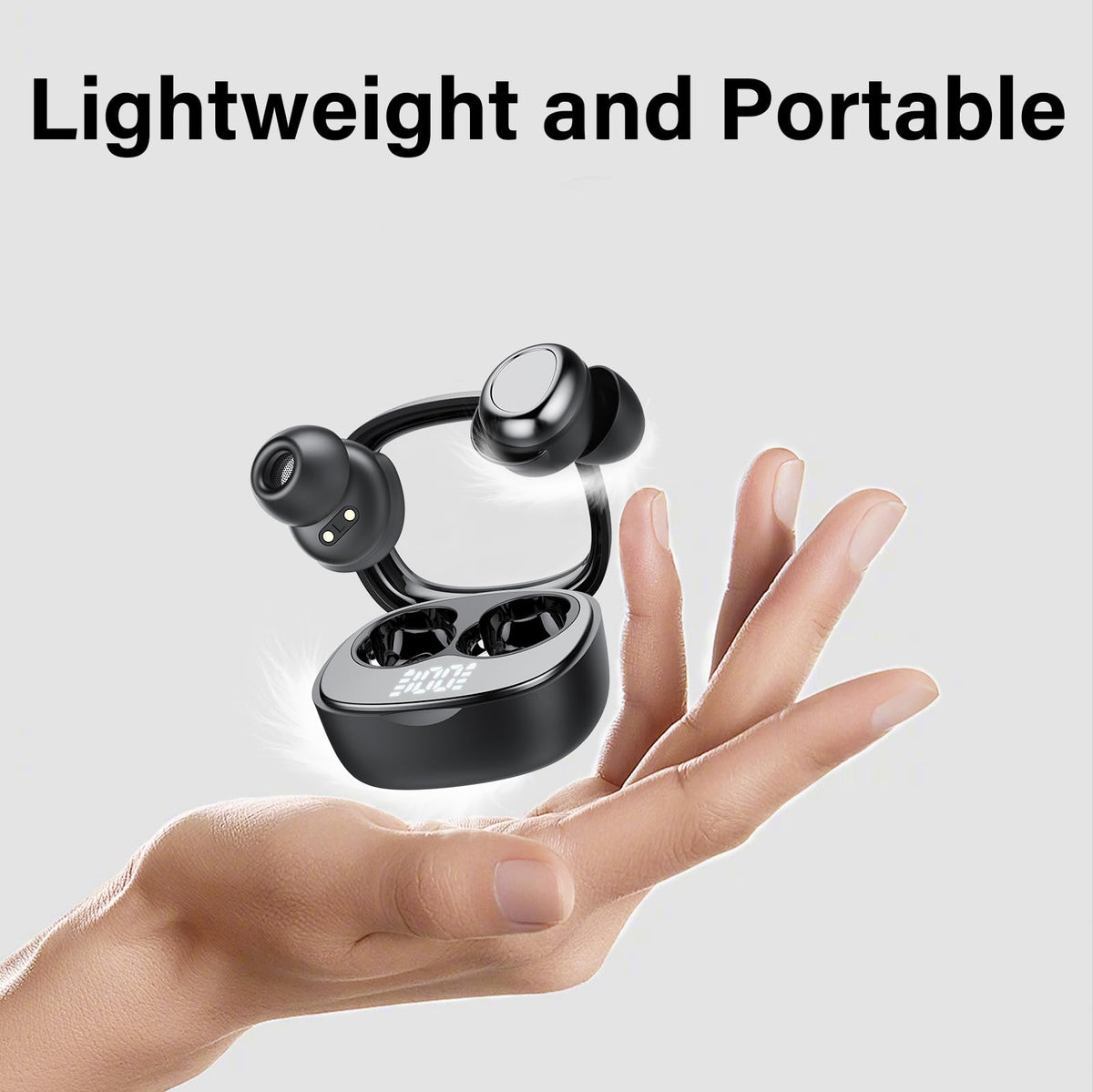 Doubc earbuds in hand for size comparison emphasizing compact portability