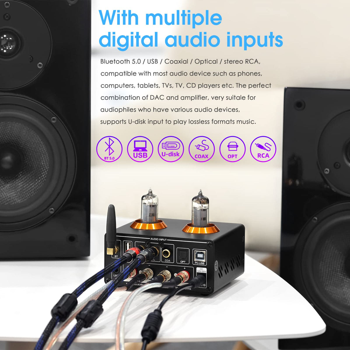 Douk Audio top view emphasizing compact chassis and decorative golden rings