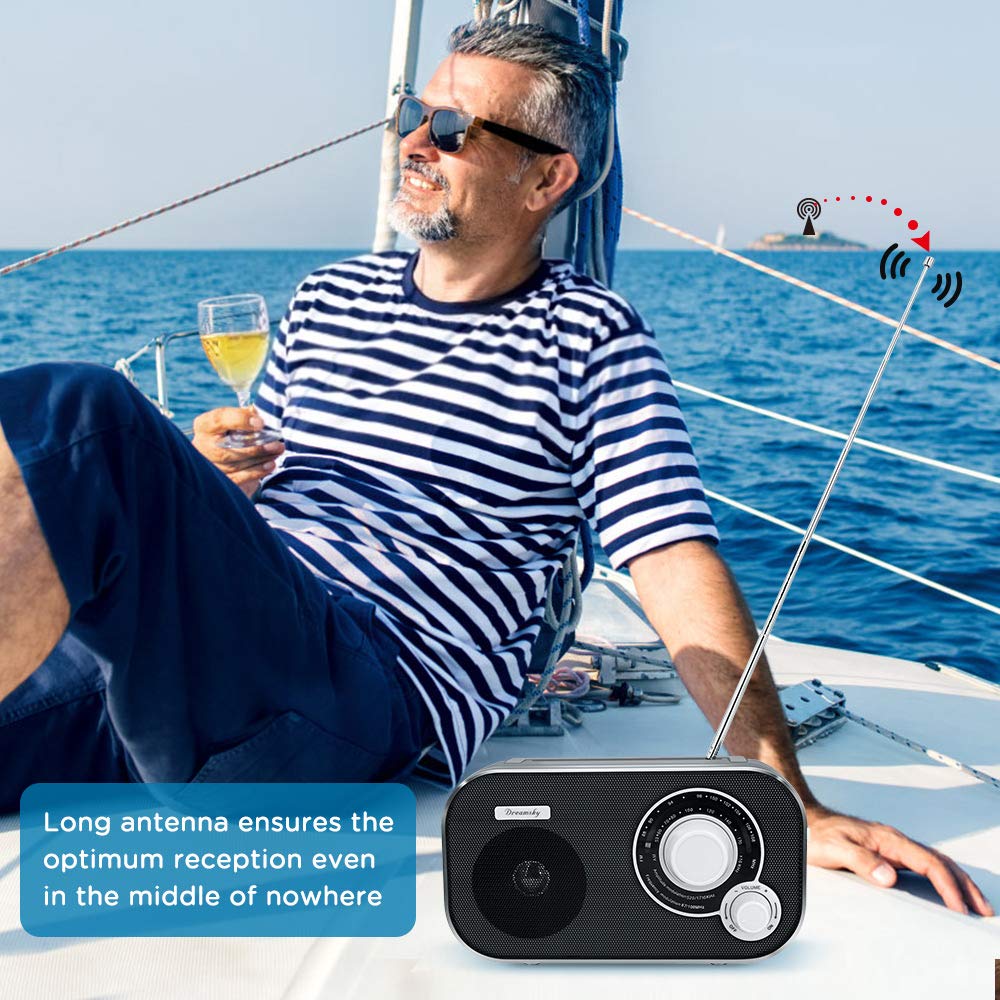 DreamSky portable radio plugged in with AC adapter for home use.
