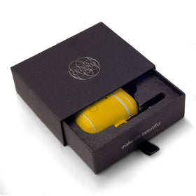 Dreem Om case cover yellow in box, gift-ready packaging.