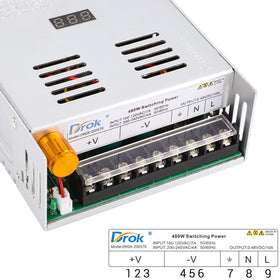 DROK LED display closeup showing precise 0.1V resolution for accurate setup