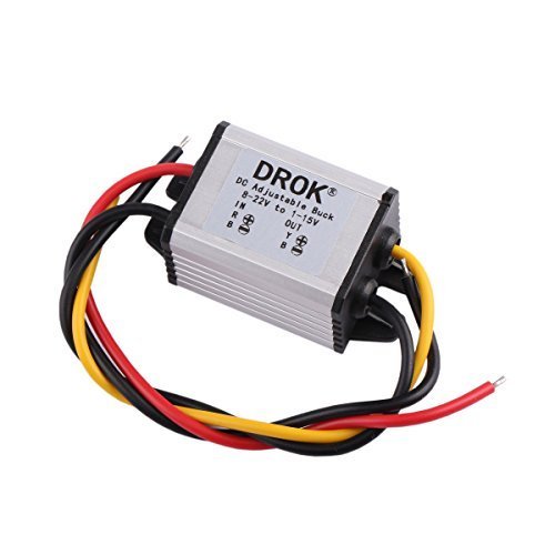 DROK regulator next to ruler showing compact size and space-saving design for tight installs
