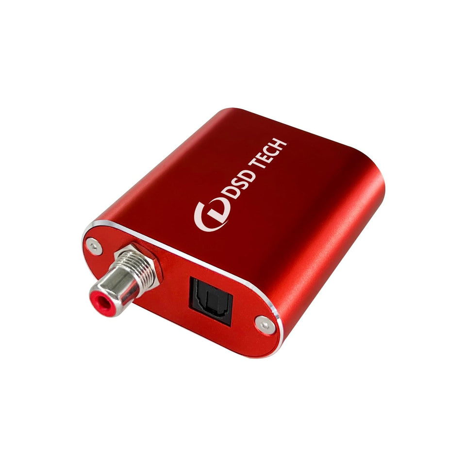 DSD TECH SH-AU02A USB to TOSLINK adapter close-up showing optical output for PCM audio.