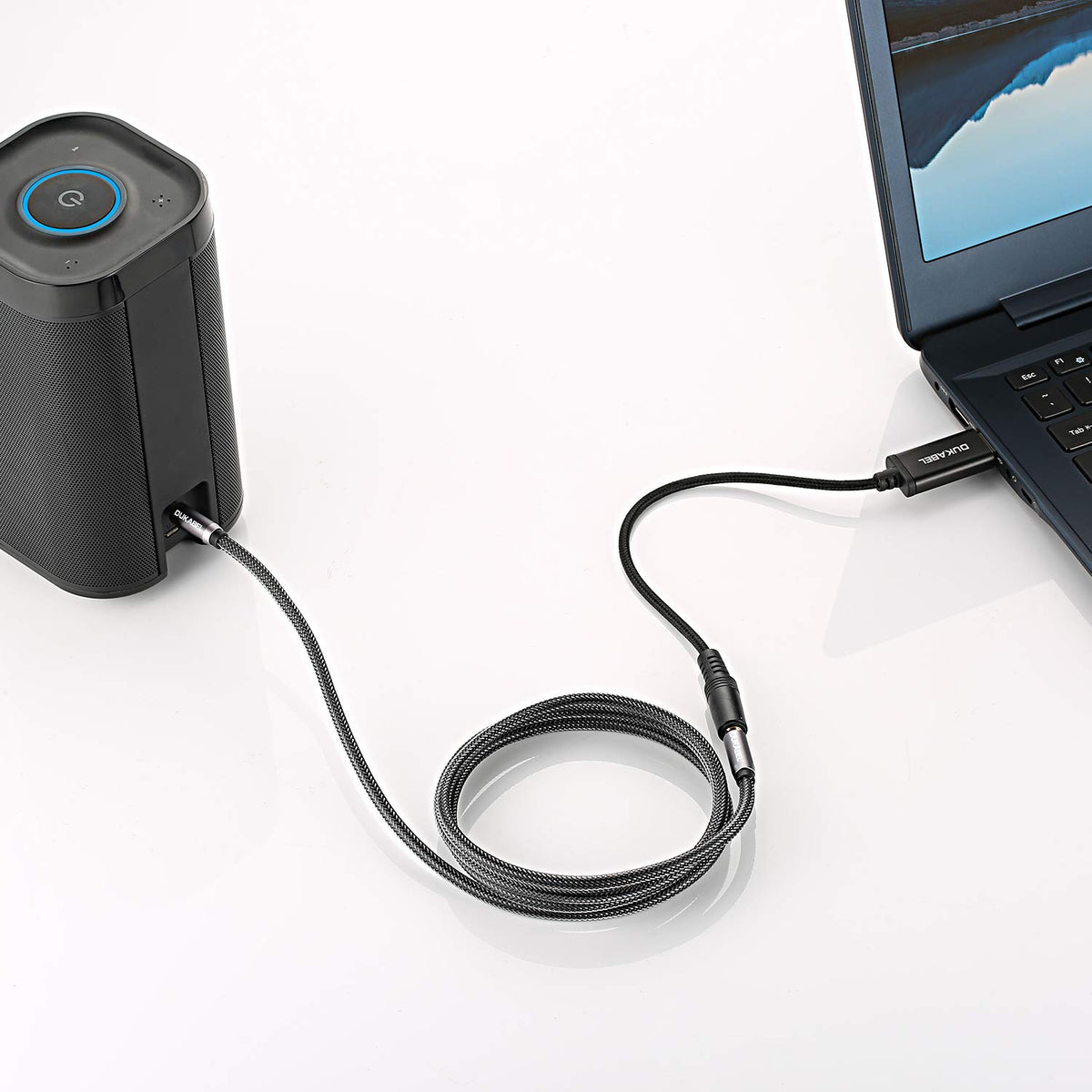 DUKABEL USB audio adapter with mic input, headset compatibility for online chats.