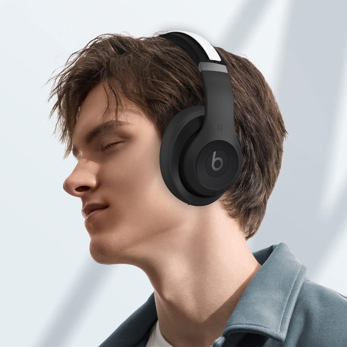 DZHAXIE lifestyle shot commuter wearing protected Beats for cleaner look