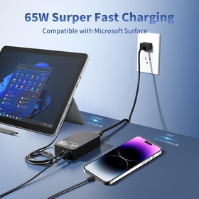 EAOYHGB 65W charger USB port powers a smartphone while the laptop charges