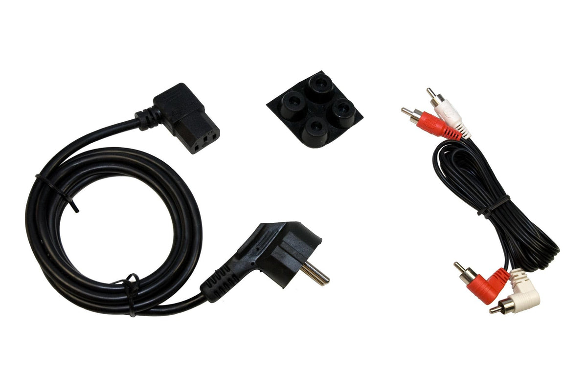Earthquake CP-8 placed between couch and wall enhances bass energy