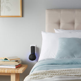 ECHOGEAR outlet-mount setup offers adjustable orientation to improve sound delivery.