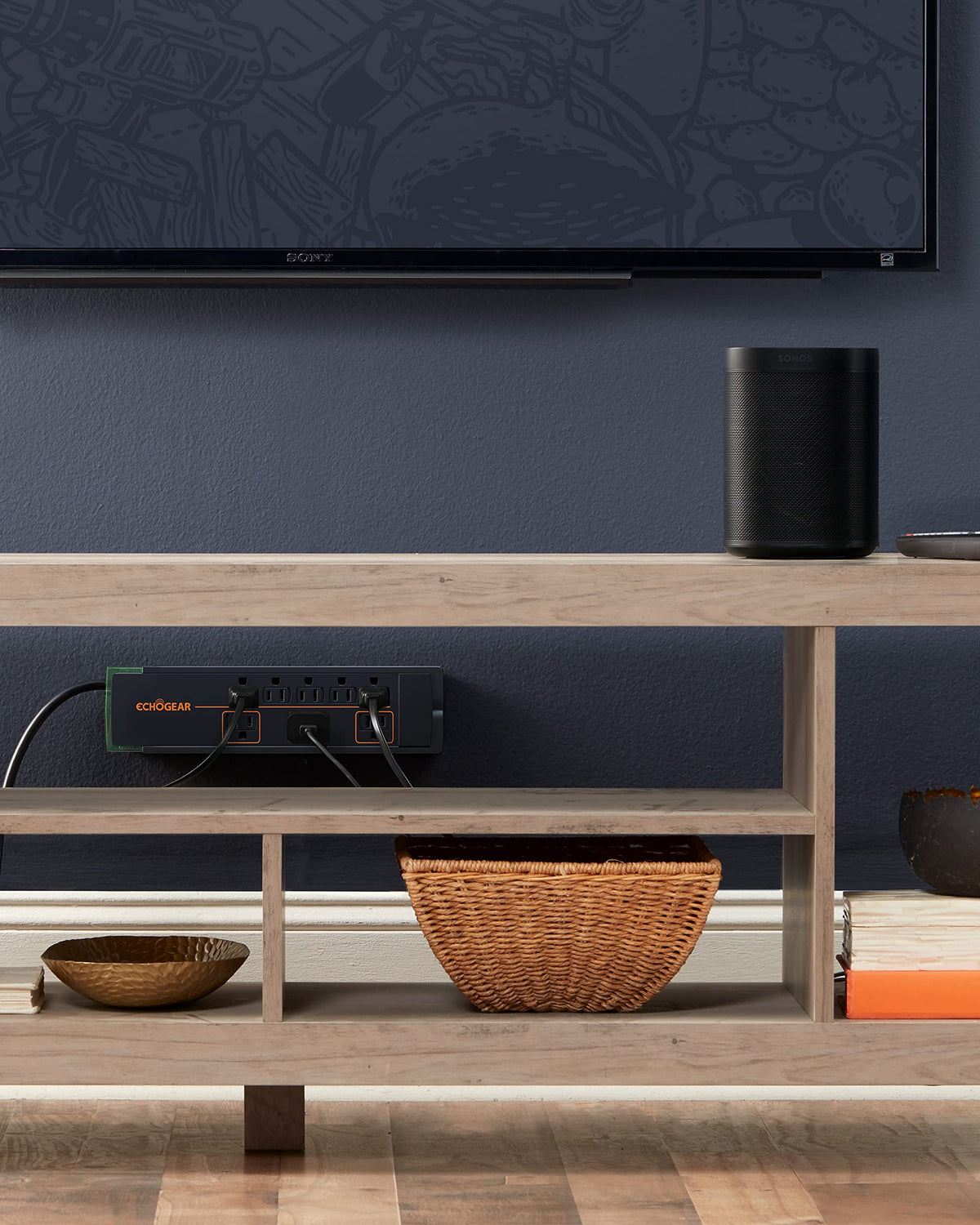 ECHOGEAR lifestyle shot showing cable management and multiple devices powered cleanly