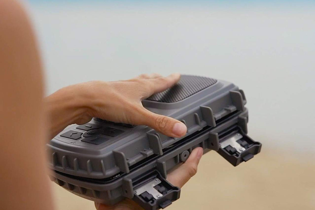 ECOXGEAR EcoExtreme 2 floating on pool water — floats to prevent loss and water damage