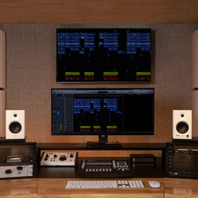 Edifier MR4 on desk setup shows compact placement for desktop listening.