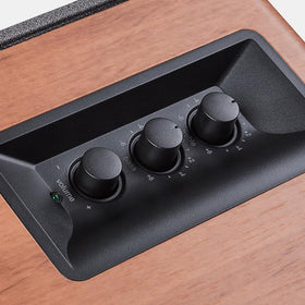 Edifier R1280T remote control for quick volume and tone adjustments