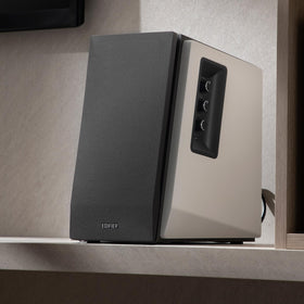 Edifier R1700BT in a compact desk setup for near-field listening.