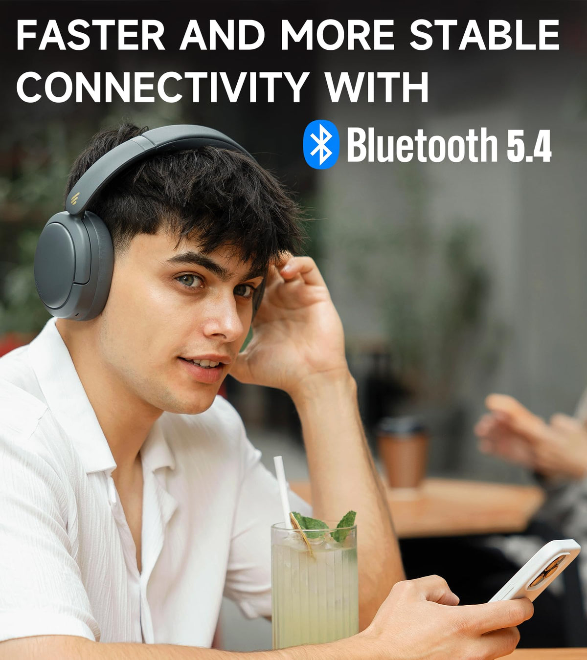 Edifier W800BT Pro worn during commute showing quieter travel listening benefit
